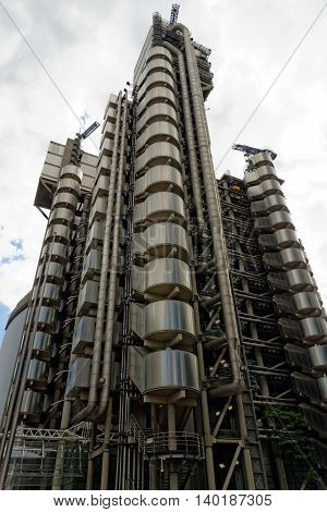 LONDON UK - JULY 1 2014: The Lloyd's Building also known as The Inside-Out Building home of insurance institution Lloyd of London. Like Pompidou Centre in Paris Lloyd was designed by Rogers 1986.