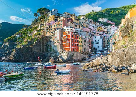 RIOMAGGIORE ITALY - JULY 4 2016: The viallage of Riomaggiore is one of the five villages along the Cinque Terre in Italy