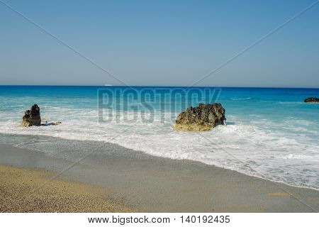 Megali Petra Is One Of The Popular Beaches In Lefkada Greece Huge Rocks In The Background