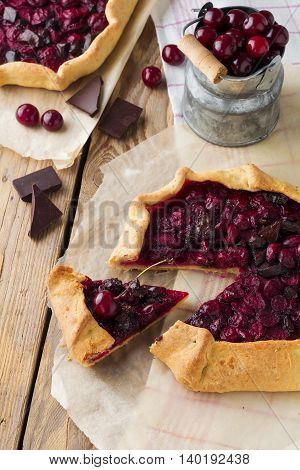 Gallet with cherries and bitter chocolate. Selective focus.