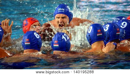 Budapest Hungary - Jul 14 2014. Hungarian team shout their battle-cry at the start. The Waterpolo European Championship was held in Alfred Hajos Swimming Centre in 2014.