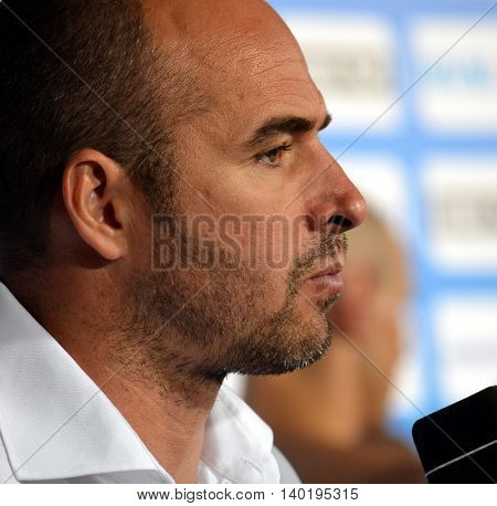 Budapest Hungary - Jul 14 2014. Tibor Benedek (Hungary) head coach talking after Spain-Hungary preliminary match. The Waterpolo European Championship was held in Alfred Hajos Swimming Centre in 2014.