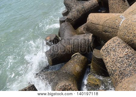 Concrete block tetrapod breakwater protect muine sea vietnam