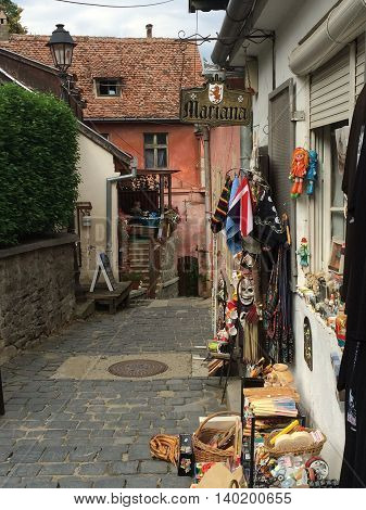 Romania, August 21, 2015, Sighisoara, Transylvania,Old Street with small shops