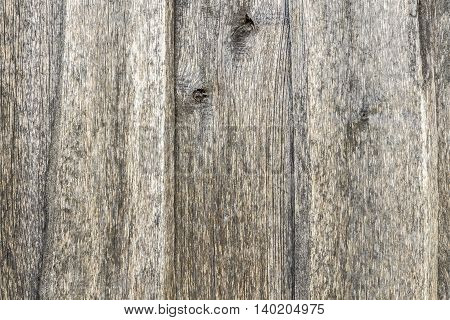 Part of the fence of the old wooden planks