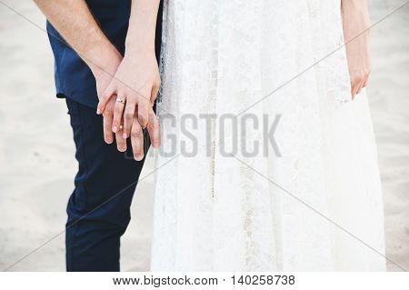 wedding hands in a wedding rings always together