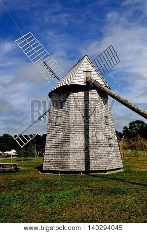 Brewster Massachusetts - July 14 2015: 18th century smock windmill at the Higgins Farm historic site on Cape Cod