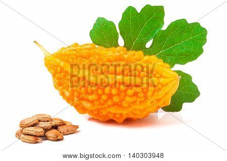 yellow momordica with leaf and seeds isolated on white background.