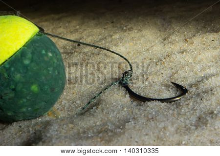 KD Snowman rig Underwater. Carp Hook Boilies Underwater. Carp fishing hook Underwater. Selective focus and shallow Depth of field