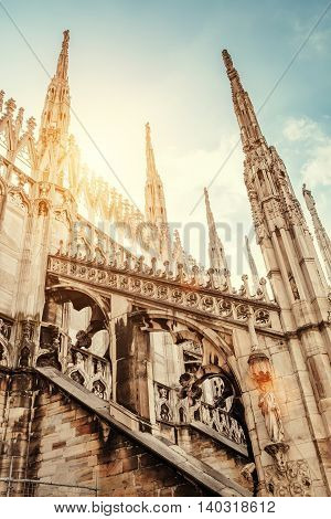 Gothic Milan Cathedral roof gallery on a sunny day