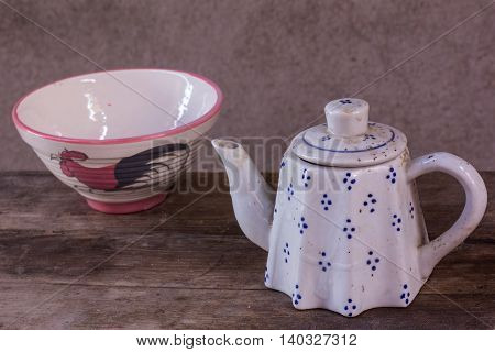 still life classic ceramic kettle with cup