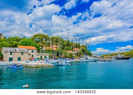 Small touristic mediterranean town Rogac on Island of Solta, waterfront summertime view, Croatia Europe.
