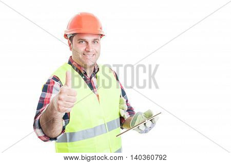 Happy Builder Holding Tablet And Showing Thumbup