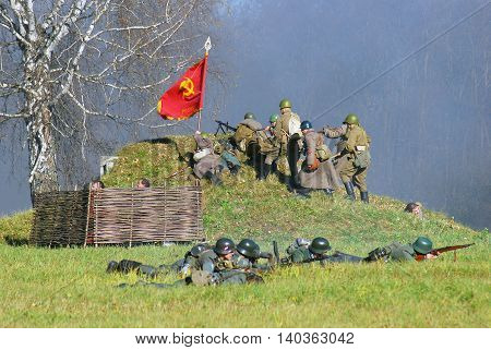 MOSCOW REGION - OCTOBER 13, 2013: Reenactors dressed as WW II soldiers. The battle they are reenacting was the Moscow Battle held in 1941.