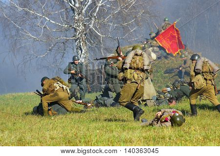 MOSCOW REGION - OCTOBER 13, 2013: Reenactors dressed as WW II soldiers at Moscow Battle historical reenactment.