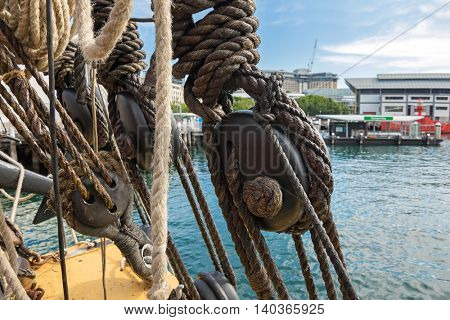 Closeup of Node, triple deadeyes and thick ropes on the ship at Sydney Harbour in New South Wales, Australia