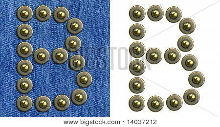 กางเกงยีนส์ rivet อักษรอักษรเกิด บนพื้นหลังของกางเกงยีนส์ และแยก