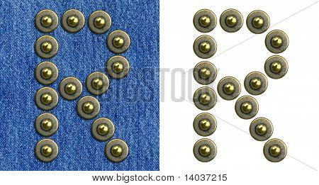 กางเกงยีนส์ rivet อักษรจดหมายอาร์ บนพื้นหลังของกางเกงยีนส์ และแยก