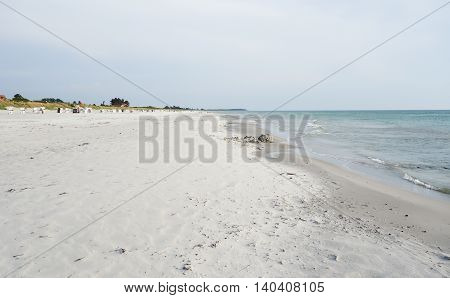 Sandy beach with beach chairs in the background on Hiddensee Island Germany