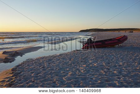 A boat at sunset on Hiddensee island Germany