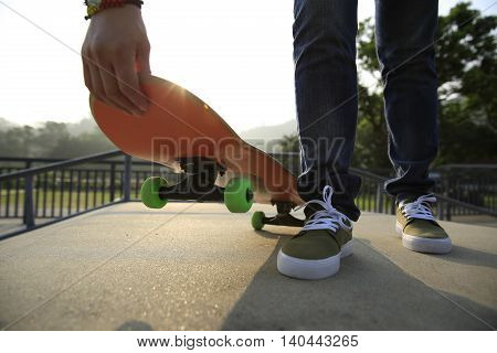 one young skateborder skateboarding at skatepark ramp