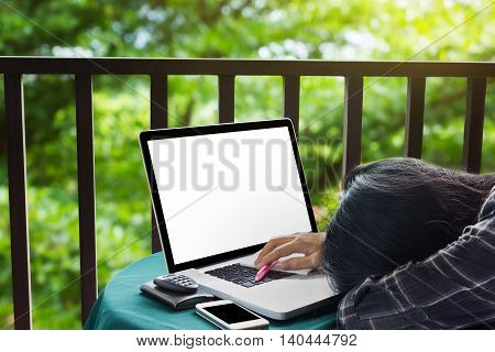 Women Tired Or Exhausted And Doze Off On Table With Laptop