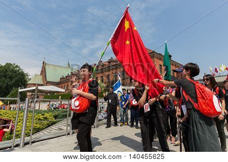 CRACOW POLAND - JULY 26 2016: World Youth Day 2016 - Pilgrims from China in the Sanctuary of Divine Mercy in Lagiewniki. Cracow Poland