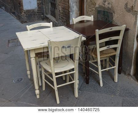 Tables and chairs of a dehors alfresco bar restaurant pub