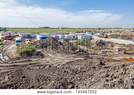 Administration settlement made of container office at building site.