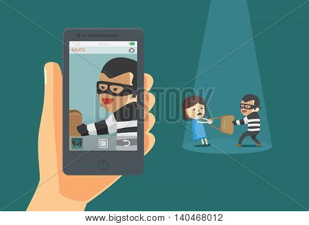 Use mobile take a photo of bandit snatching bag of woman.