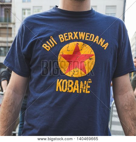 MILAN ITALY - JULY 27 2016: Kurdish activist protests against Turkish president Erdogan and his policy and ask freedom for PKK leader Ocalan.