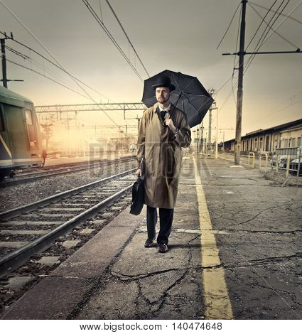 English businessman waiting at the train station