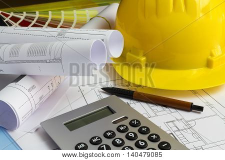 An office desk with the project papers
