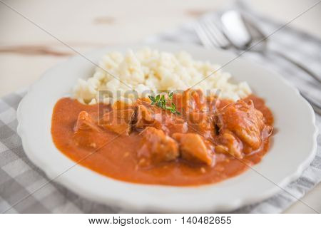 Traditional Hungarian hot goulash soup in a bowl