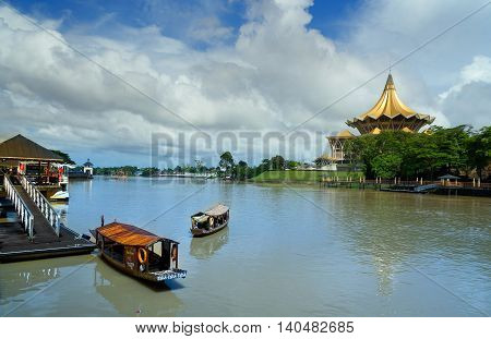 Traditional Boats On Sarawak River In Kuching City