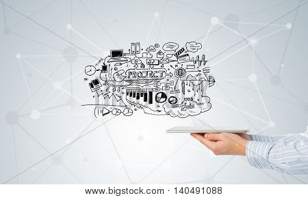 Businessman hand demostrating business strategy plan on tablet screen