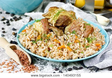 Devzira pilaf with lamb and spices traditional Uzbek cuisine selective focus