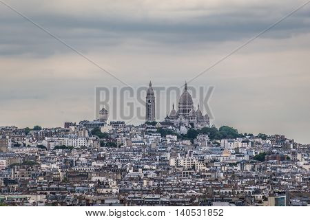Sacre Coeur on the hill, skyline Paris.