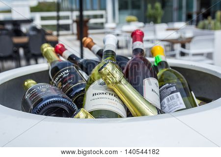 Kijkduin the Netherlands - July 30 2016: wine bottles in a cool box at a beach side hotel