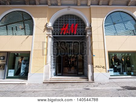 ATHENS-AUGUST 22: H&M store showcase on Emrou street on August 222014 Athens Greece. H & M is a Swedish retail-clothing company known for its fast-fashion clothing for men women and children.