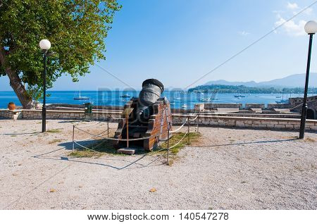 Antique Canon looking towards the seacoast inside the Old Fortress. Corfu islandGreece.