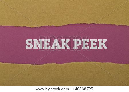 SNEAK PEEK word written under torn paper.