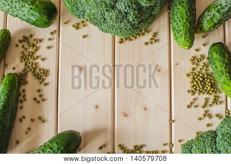 Healthy Organic Vegetables On A Wooden Background.