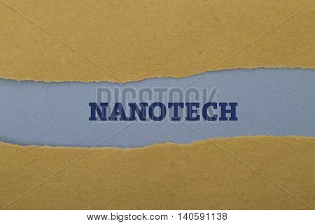 Nanotech word written under torn paper .