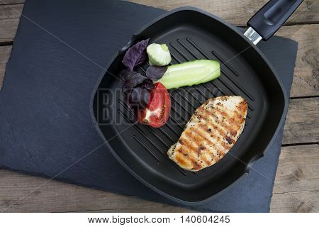 Grilled Chicken Breast With Vegetables And Herbs