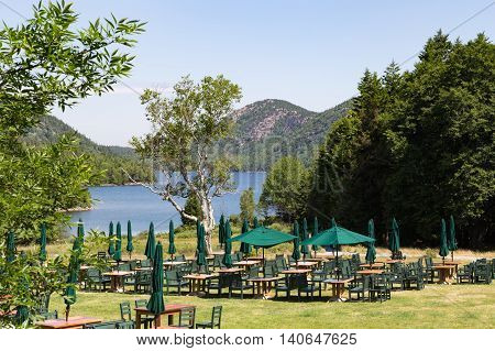 Outdoor dining area over looking Jordan Pond at Acadia National Park in Maine. Image shot before restaurant opened.