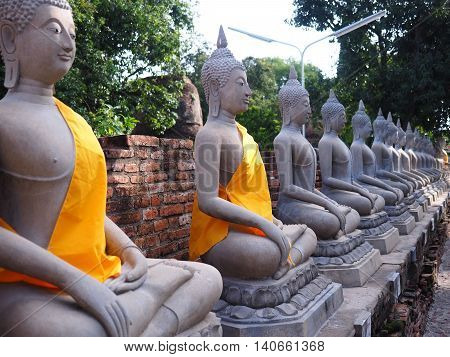 line of buddha statue in chaimongkol temple, ayutthaya, Thailand