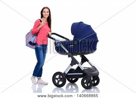 Full length portrait of a mother with a stroller, isolated on white background