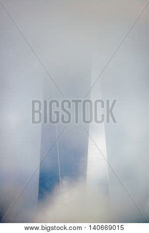 NEW YORK CITY - NOV 12: One World Trade Center in fog on November 12, 2014 in Manhattan, New York City. With population of 8.4M, it is the most populous city in the United States.