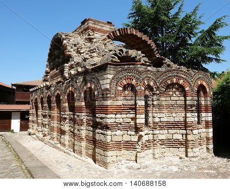NESSEBAR BULGARIA - JUNE 15 2011: Old church of Saints Mikhael and Gavriil on the square in the old Nessebar town coast of Black Sea Sunny Beach Bulgaria.